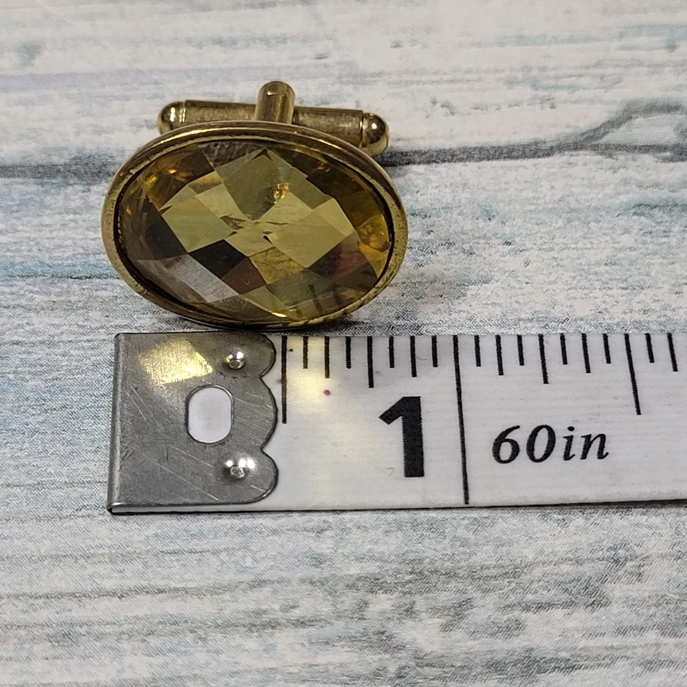 Yellow Plastic rhinestone Cuff Links.